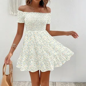 Vintage floral off-the-shoulder French mini dress with smocked bodice and ruffles