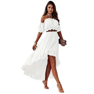 Elegant white two-piece outfit with off-shoulder ruffle top and tiered high-low skirt