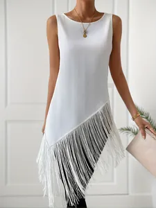 Detail of white ribbed knit sleeveless top featuring an asymmetrical fringe hem design.