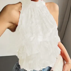 Chic white sleeveless mock neck top featuring elegant layered fringe and romantic style