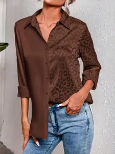 Detailed view of women's long sleeve patchwork shirt with elegant leopard print design
