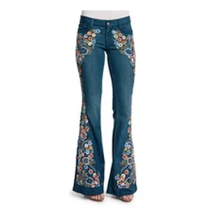 Women's floral embroidered flare jeans featuring colorful detailed flower patterns.