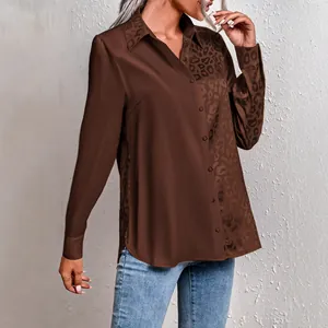 Elegant brown long sleeve shirt with leopard print panel and polo collar for women.