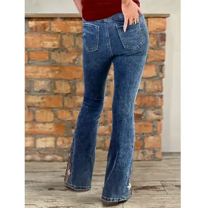 Stylish classic blue stretch flare jeans with exquisite floral embroidery details
