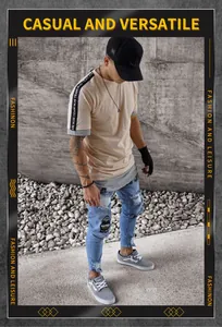 Detail of men's distressed skinny jeans with embroidered patches in a street style