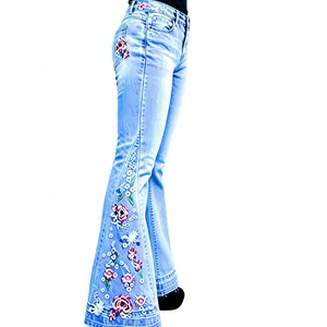Women's high-waisted light wash flare jeans with heavy floral embroidery and sequins