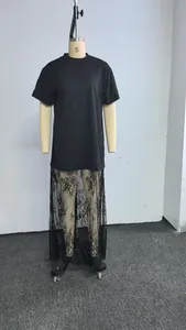 Black plus size t-shirt dress featuring elegant lace patchwork design on mannequin