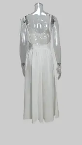 Back view of an elegant white backless maxi camisole dress with a high waist design