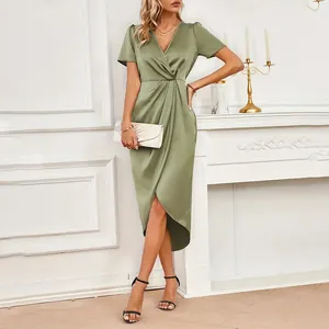 Elegant sage green satin wrap dress with crossover V-neck and tulip hem detail