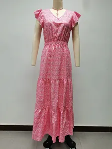Pink floral V-neck tiered maxi dress with ruffled sleeves displayed on mannequin