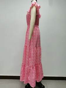 Side view detail of a pink floral layered V-neck maxi dress on a mannequin