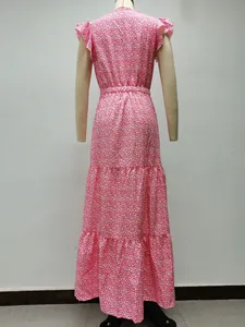 Back view of pink floral print layered maxi dress on mannequin.