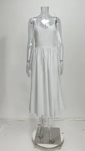 Elegant white V-neck camisole dress with high waist displayed on transparent mannequin.