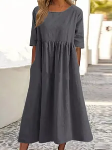 Detail view of round neck cotton linen maxi dress with five-point sleeves and pockets