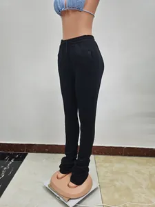Detailed side profile of women's black high waisted drawstring casual stacked sweatpants