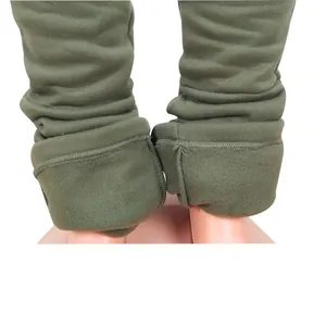 Close-up macro detail showing thick fleece lining on green plus size stacked joggers