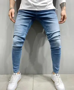 Stylish light blue slim fit men's skinny denim jeans with vintage wash finish.
