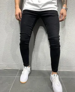Men's slim fit black skinny jeans featuring a tapered leg and comfortable stretch fabric