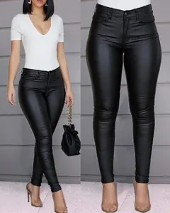Close-up detail view of women's slim fit high-waisted black PU leather pants