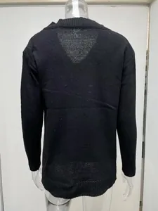 Detailed back view of a loose-fit solid black long-sleeved V-neck knitted sweater
