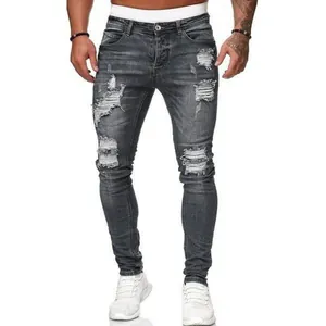 Premium men's dark grey washed slim fit ripped denim jeans with distressed details