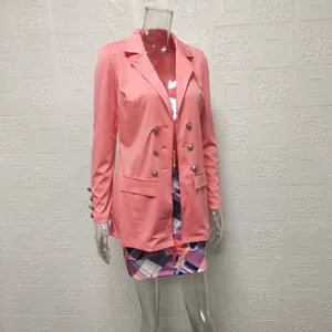 Chic peach-pink blazer and plaid mini skirt two-piece outfit set for women.