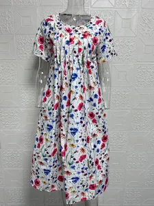 Women's floral print short sleeve casual summer dress displayed on a clear mannequin