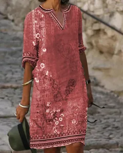 Detail view of terracotta ethnic print V-neck casual dress for summer