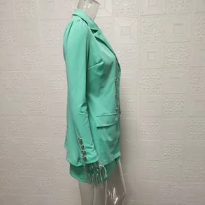 Side view of a slim-fit mint green fashion blazer and skirt two-piece set for women