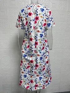 Back view of a short-sleeved casual maxi dress with colorful floral print design.