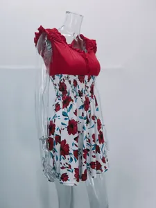 Side view showing details of elegant red top floral print summer dress on mannequin