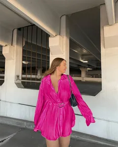 Fashionable pleated long-sleeved shirt dress in vibrant pink for autumn