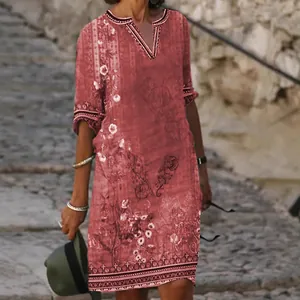 Elegante zomerse midi-jurk voor dames met retro bloemenprint en V-hals in terracotta kleur