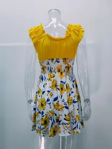 Detailed front view of an elegant summer dress with U-neck and floral skirt