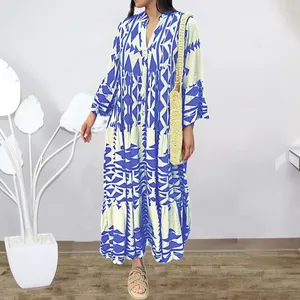 Elegant bohemian blue and white printed maxi dress with V-neck shirt style buttons