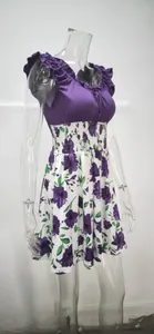 Detail of elegant purple and white floral summer dress with U-neck and ruffle sleeves.