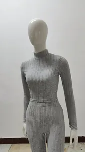 Close-up detail of a professional grey ribbed knit two-piece set on a mannequin.