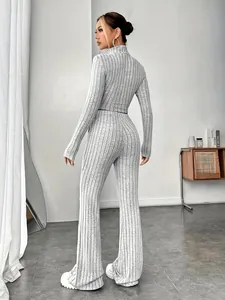 Detailed back view of a grey ribbed knit two-piece set featuring slim crop top and wide-leg pants