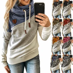 Display of various color variants for cowl neck color-block hoodie with drawstring detail