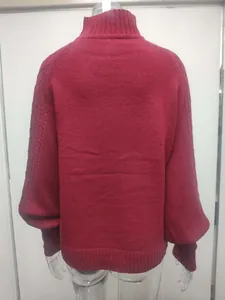 Detailed back view of an elegant burgundy knit sweater featuring stylish lantern sleeves