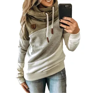 Close-up of women's trendy color-block cowl neck hoodie in khaki grey and white