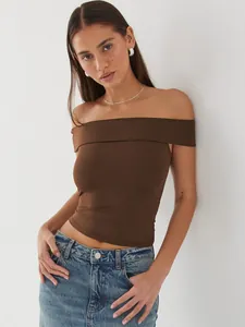 Detail view showing a slim fit brown off-the-shoulder T-shirt for a chic summer look
