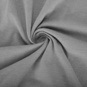 Gros plan de la texture du tissu en maille grise de haute qualité avec tissage