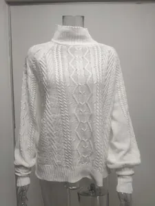 Detailed view of white cable knit turtleneck sweater with elegant lantern sleeves.