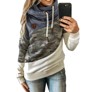 Detail view of women's cowl neck hoodie featuring camouflage color-block design