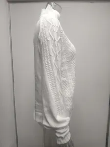 Detailed side profile of an elegant white cable knit sweater with stylish lantern sleeves.