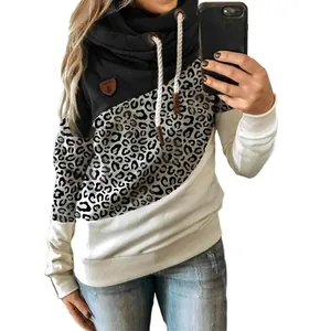 Close-up of women's leopard print patchwork cowl neck hoodie with white rope drawstring