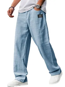 Pantalones holgados de algodón y lino azul claro para hombre con detalle de parche