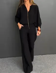 Elegant black casual two-piece linen set featuring a V-neck long sleeve top and wide trousers