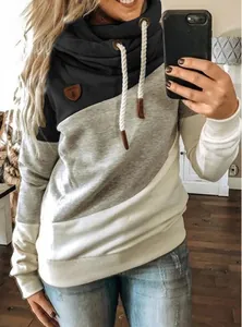 Detail of women's color-block cowl neck hoodie with drawstring cords and cozy fit